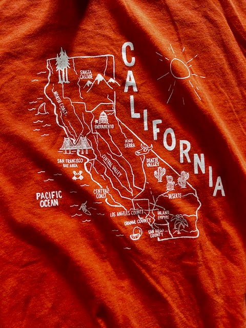 Red fabric with a white map of California design