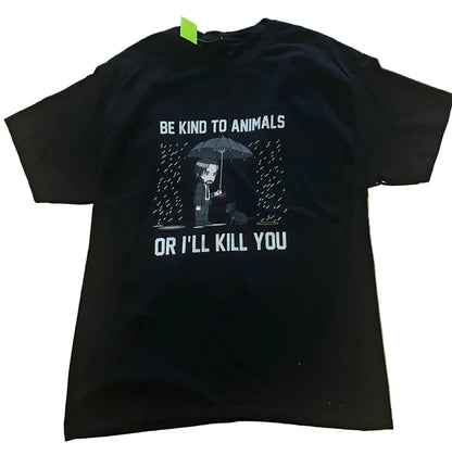 Black t-shirt with funny animal rights graphic design and text on a tiled floor