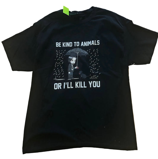 Black t-shirt with funny animal rights graphic design and text on a tiled floor