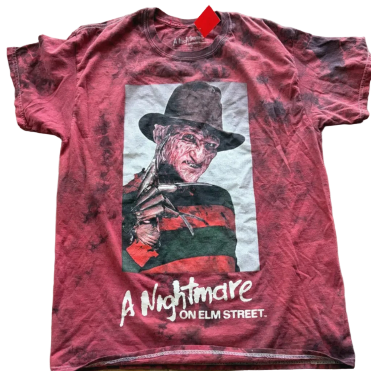 Red t-shirt with 'A Nightmare on Elm Street' graphic. Pre loved vintage tees. 