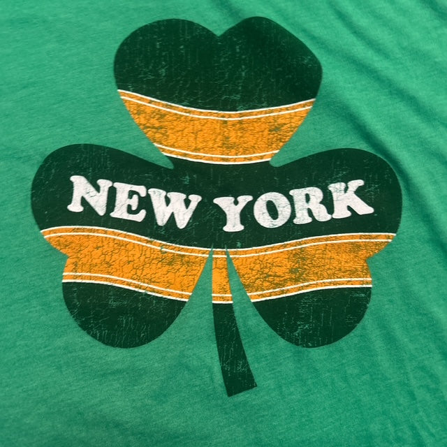 Green t-shirt with a shamrock design featuring 'New York' text on a green background