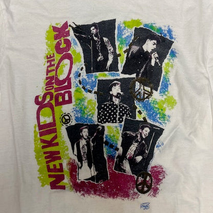 White t-shirt with 'New Kids on the Block' graphic design featuring band members.