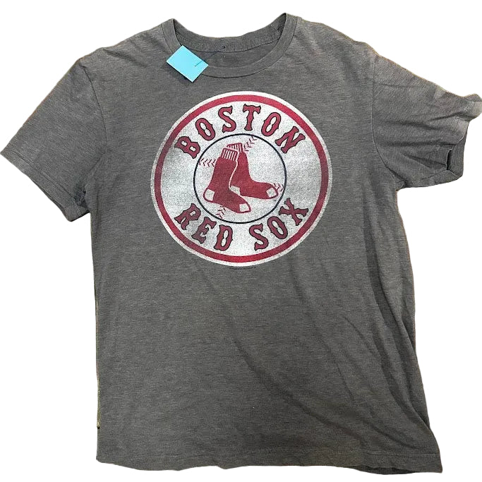Gray t-shirt with Boston Red Sox logo on a stone surface